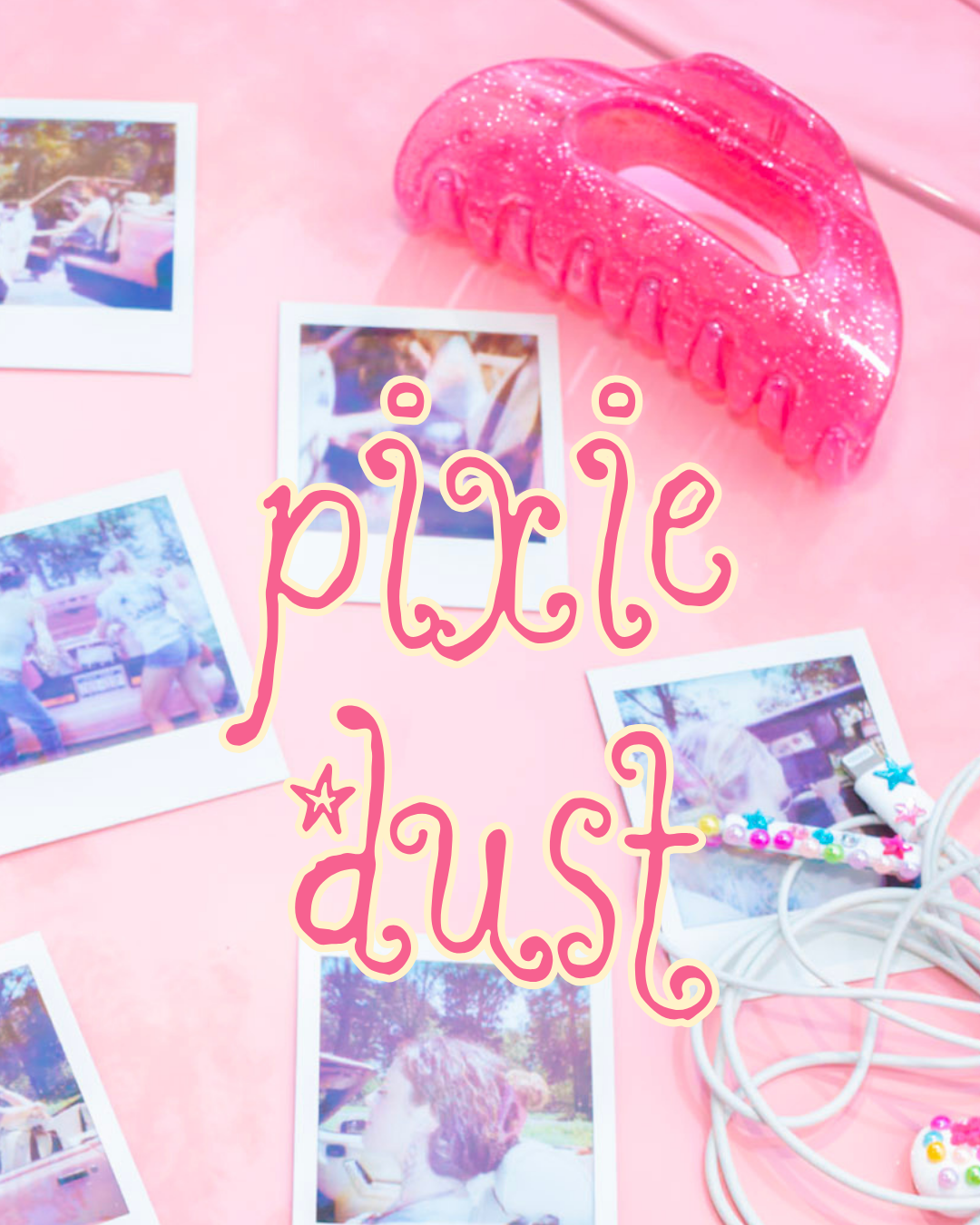 Overhead view of the Pixie Dust flexible claw clip showcasing glittery pink jelly styling with Polaroid photos and Pixie Dust text